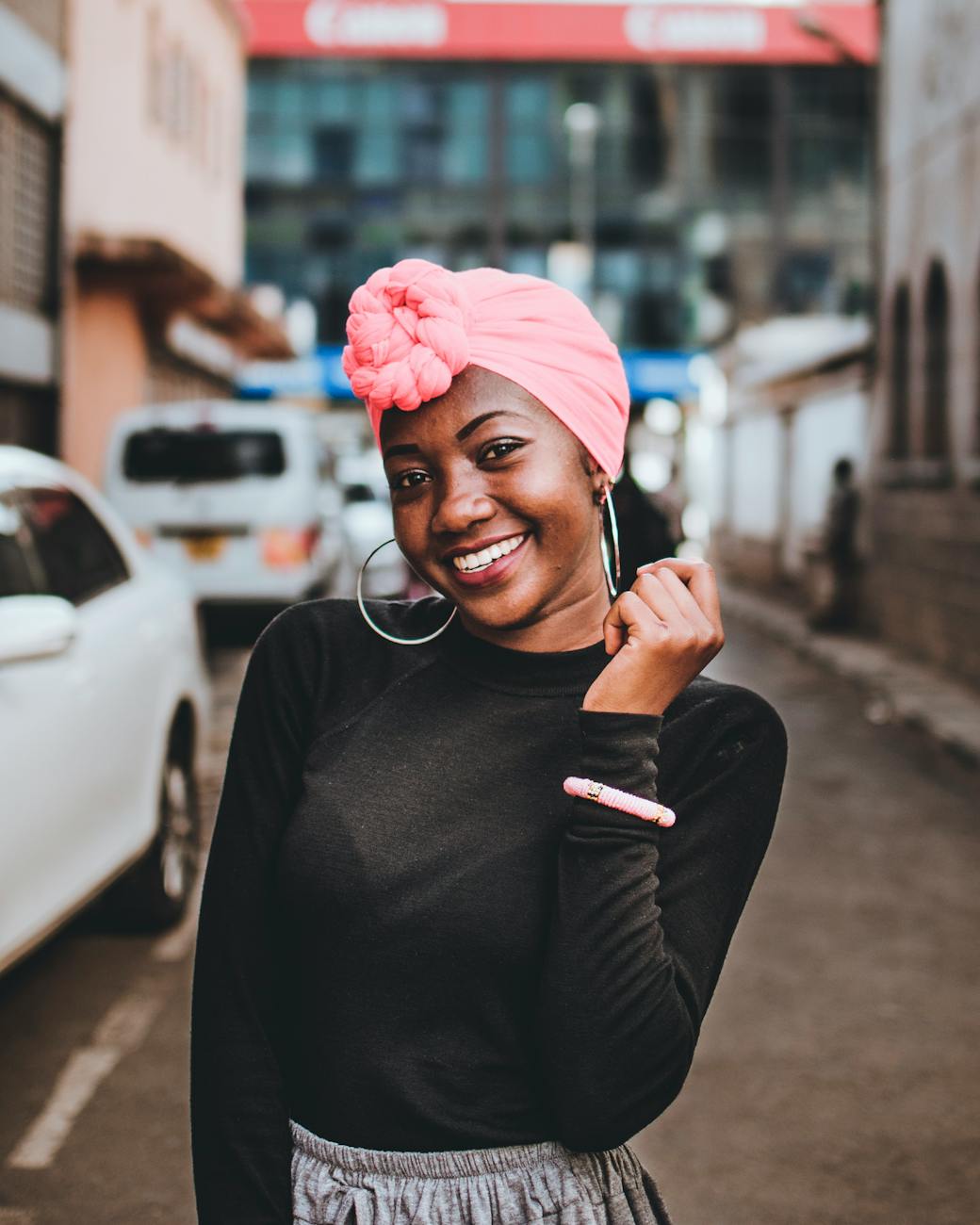 Portrait of a happy, confident woman with a natural background.
